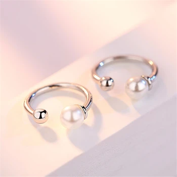 Fashion simpel nye lady pearl øreklips temperament elegante populære runde sølv farve øreringe kvindelige smykker