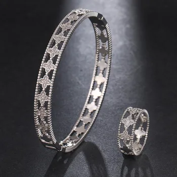 Kvinder ' s flower armbånd ring to delt sæt i høj kvalitet zircon plante, blomst hule design smykker sæt 2stk