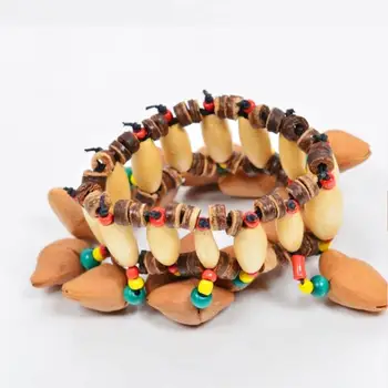Afrikansk Tromme Handbell Hånd Kæde Gadget musikinstrument 12 * 7 * 5.5 cm Nut Shell Klokkespil Rekvisitter Slagtøj Armbånd Gave