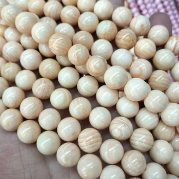 Længde 38cm natur cypraecassia rufa shell perler tridacna rund kugle lys brun farve 6mm 8mm 10mnm 12mm for kvinder armbånd