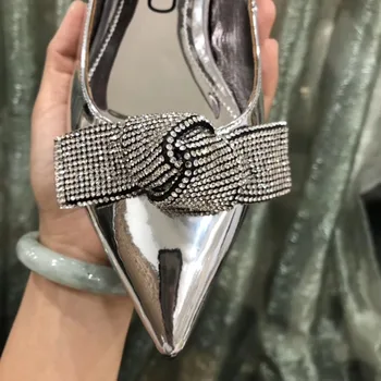 Gratis forsendelse fashion kvinder Casual Designer silver patent læder bue strass crystal punkt tå lejligheder bride bryllup sko