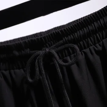 Nye 2021 sommer plus size sport-bukser for kvinder, store løse casual bomuld sort grå lomme, bælte lange bukser 4XL 5XL 6XL 7XL