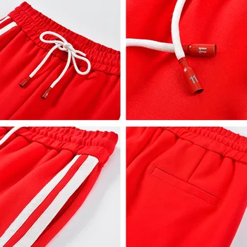 Shangege kvinders sports bukser nye løs harem lady bukser til side stribe elastiske talje gratis forsendelse og dropshipping