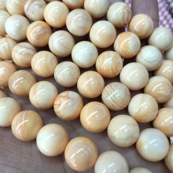 Længde 38cm natur cypraecassia rufa shell perler tridacna rund kugle lys brun farve 6mm 8mm 10mnm 12mm for kvinder armbånd