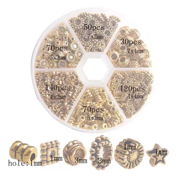 En Kasse med 480PCS Antiqued Guld Metal Star Rør Pladsen Spacer Perler til smykkefremstilling