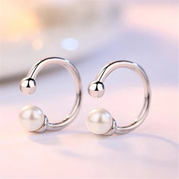 Fashion simpel nye lady pearl øreklips temperament elegante populære runde sølv farve øreringe kvindelige smykker